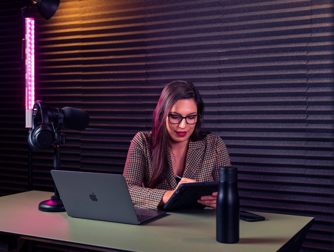 woman editing footage on laptop