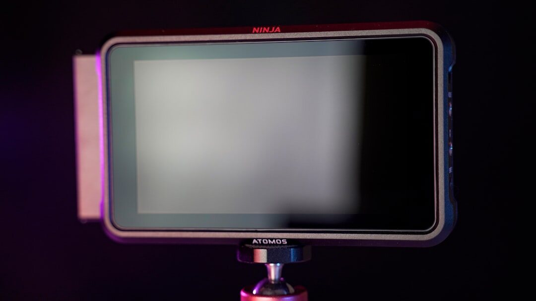 Colorist monitor displaying color correction scopes and a graded film frame