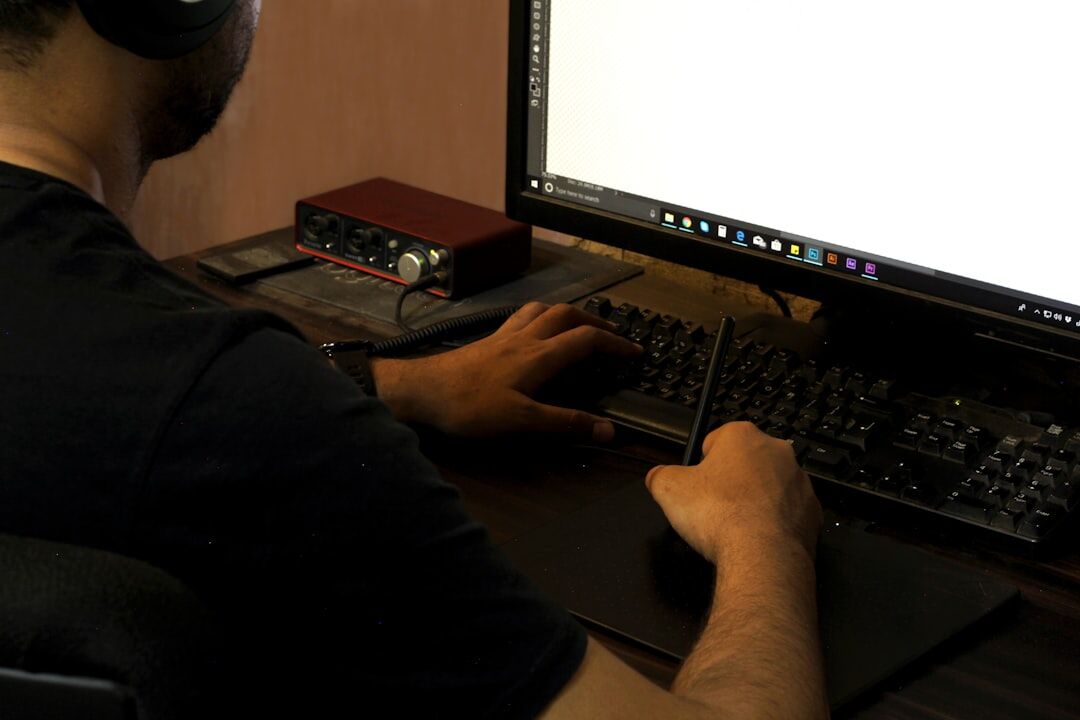 video editor working on computer